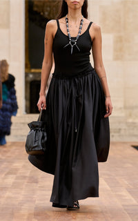 Dea Skirt en noir uni drap de costume