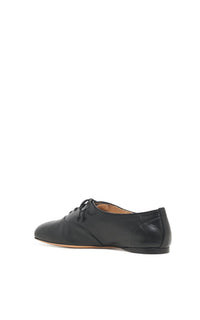 Maya Flat en noir lamb cuir