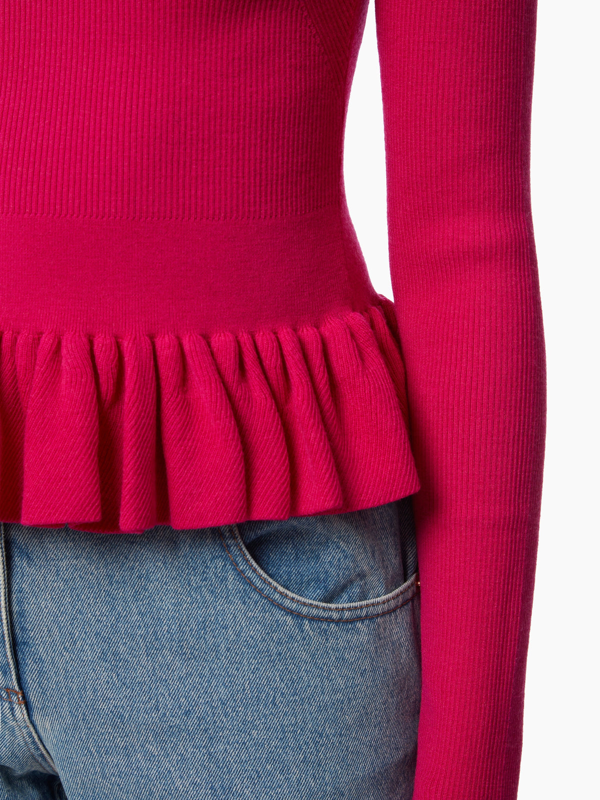 PULL AVEC UN PEPLUM À VOLANTS
