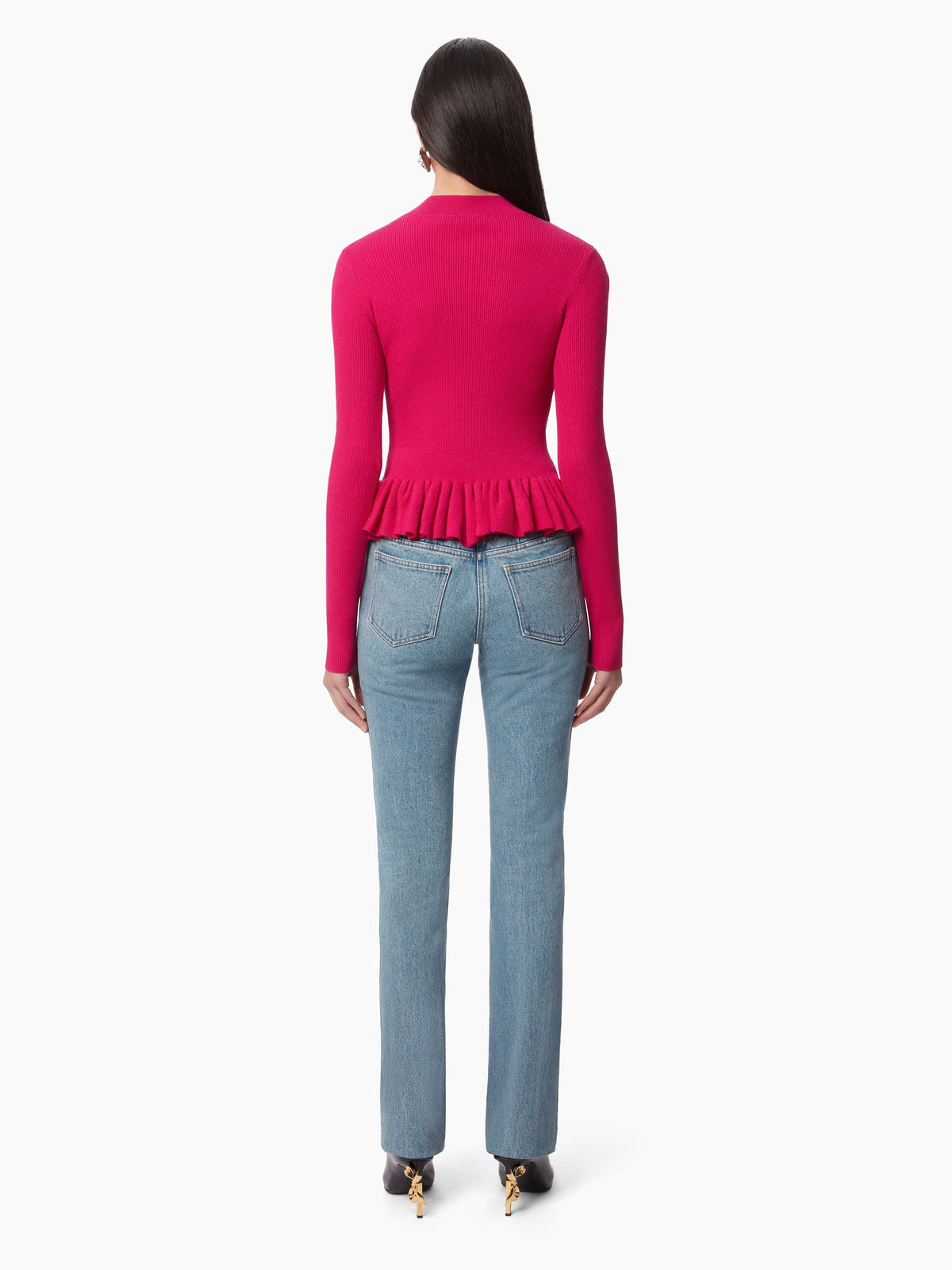 PULL AVEC UN PEPLUM À VOLANTS