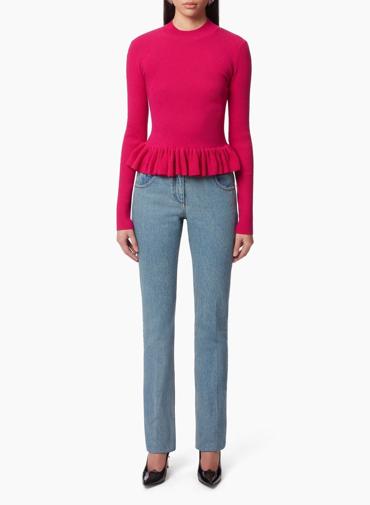 PULL AVEC UN PEPLUM À VOLANTS