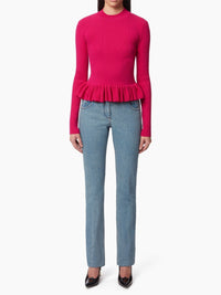 PULL AVEC UN PEPLUM À VOLANTS - Rose