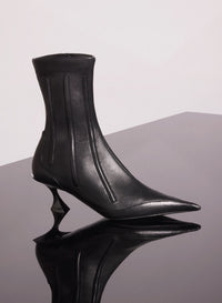 RED BONED LEATHER FANG 55 ANKLE BOOTS