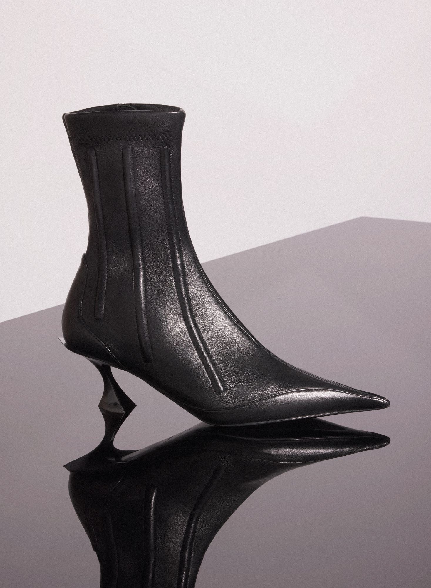 RED BONED LEATHER FANG 55 ANKLE BOOTS