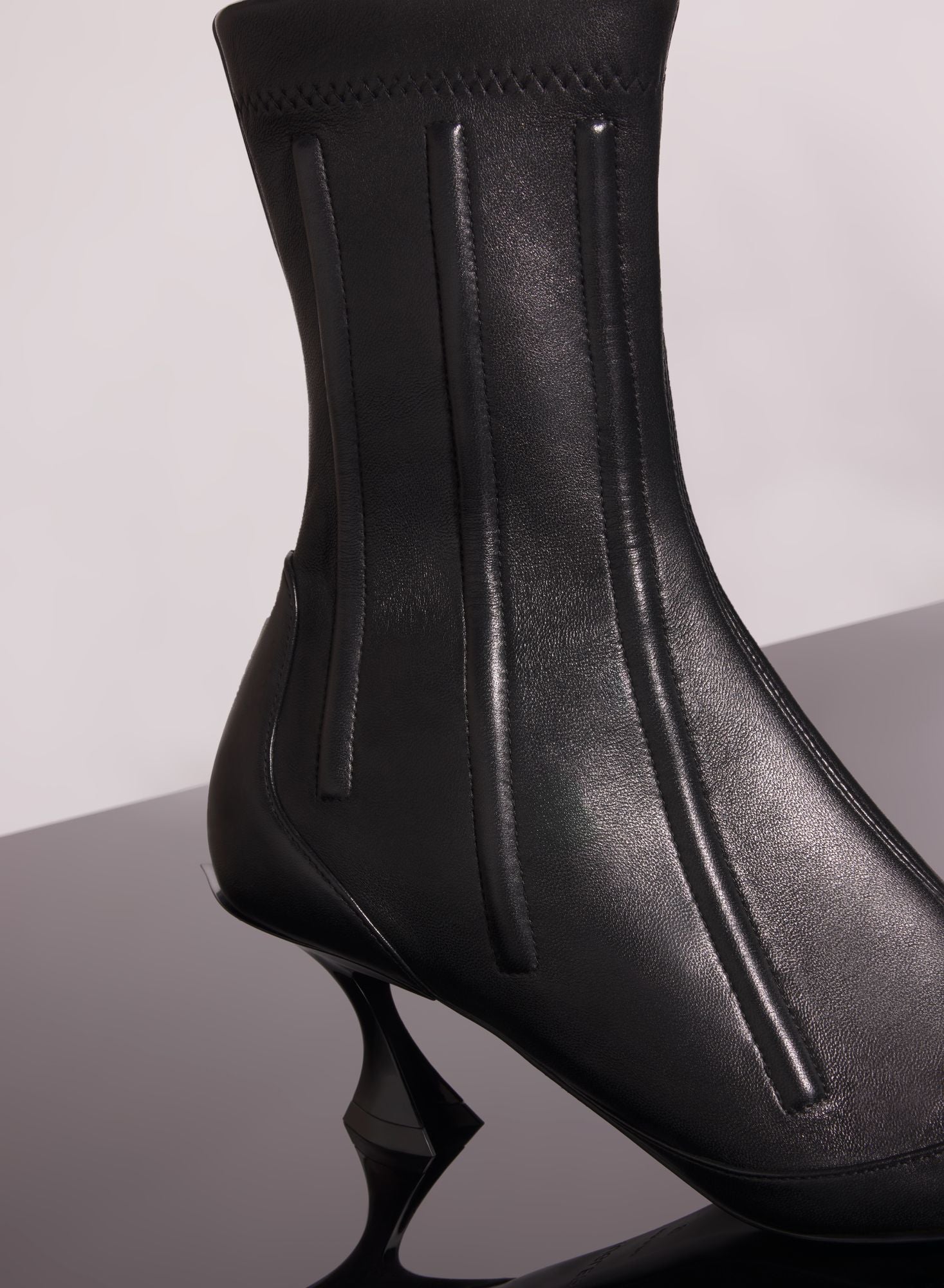RED BONED LEATHER FANG 55 ANKLE BOOTS