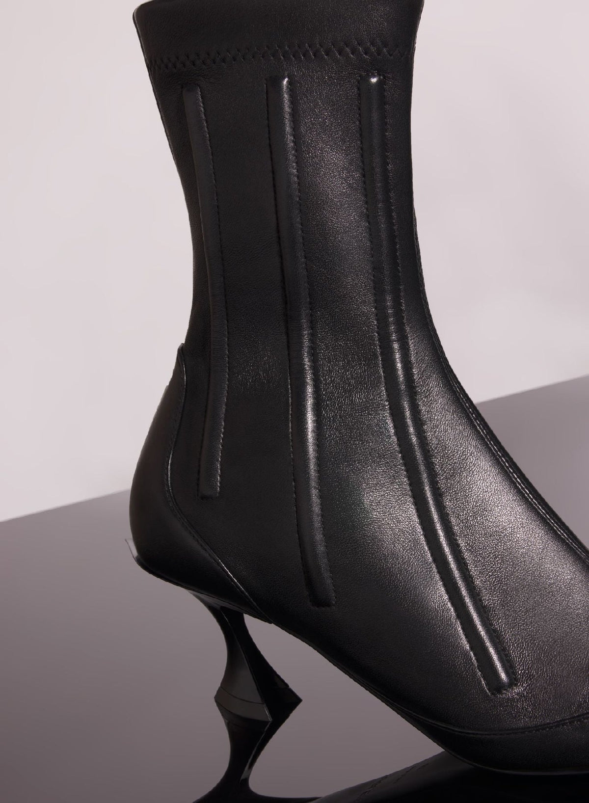 BLACK // black boned leather fang 55 ankle boots