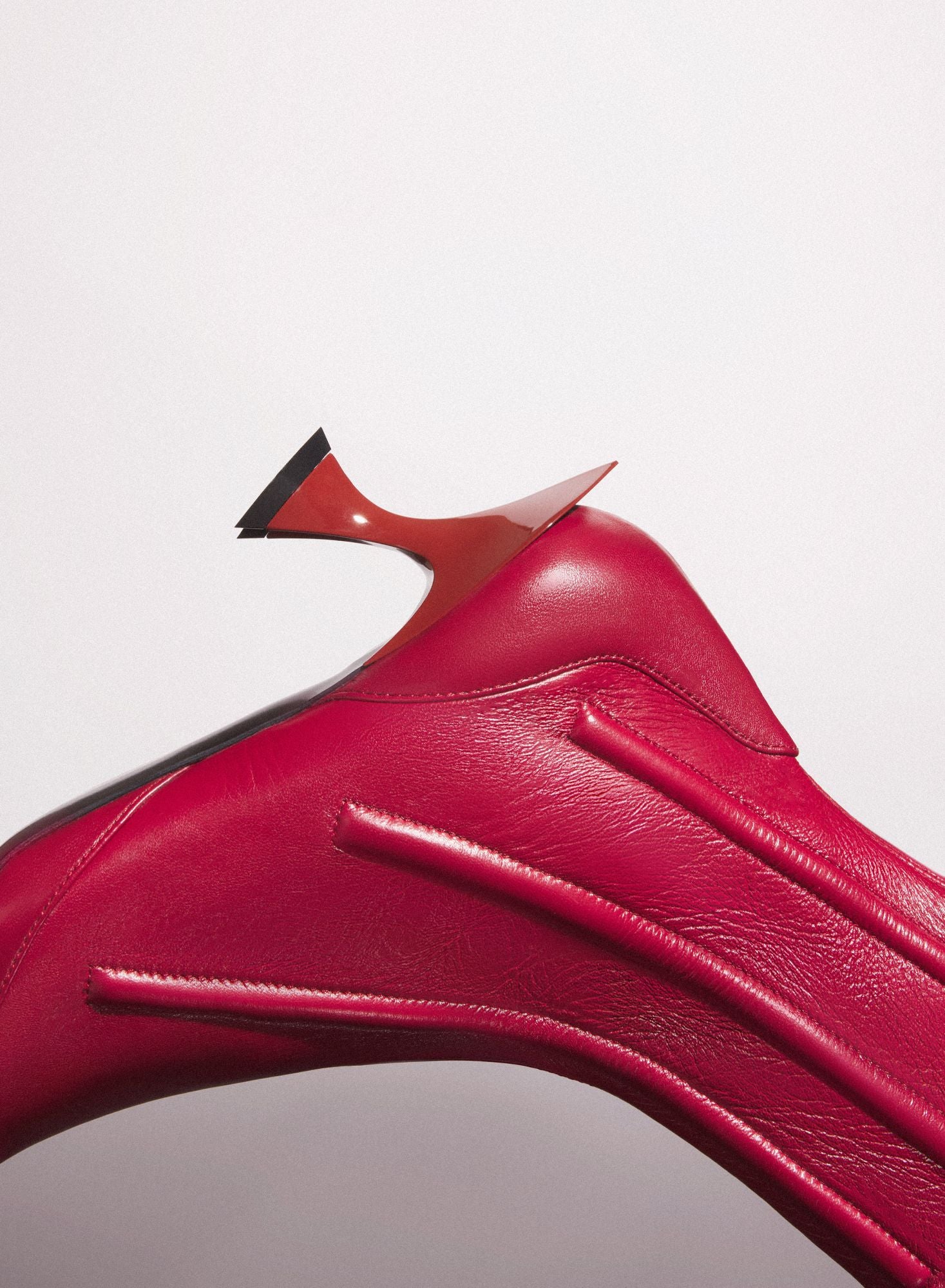 RED BONED LEATHER FANG 55 ANKLE BOOTS