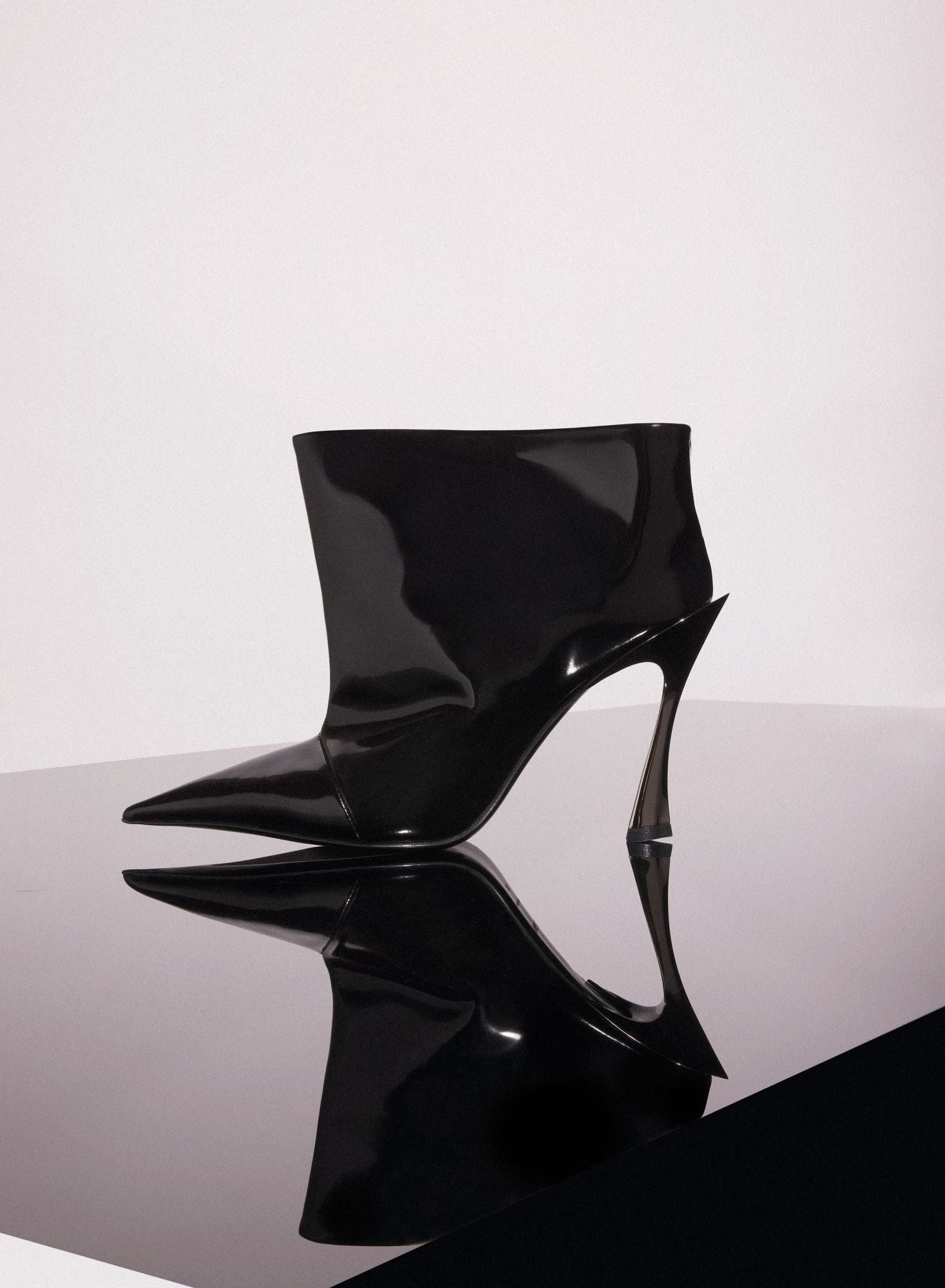 BLACK SHINY LEATHER PIERCING FANG 95 ANKLE BOOTS