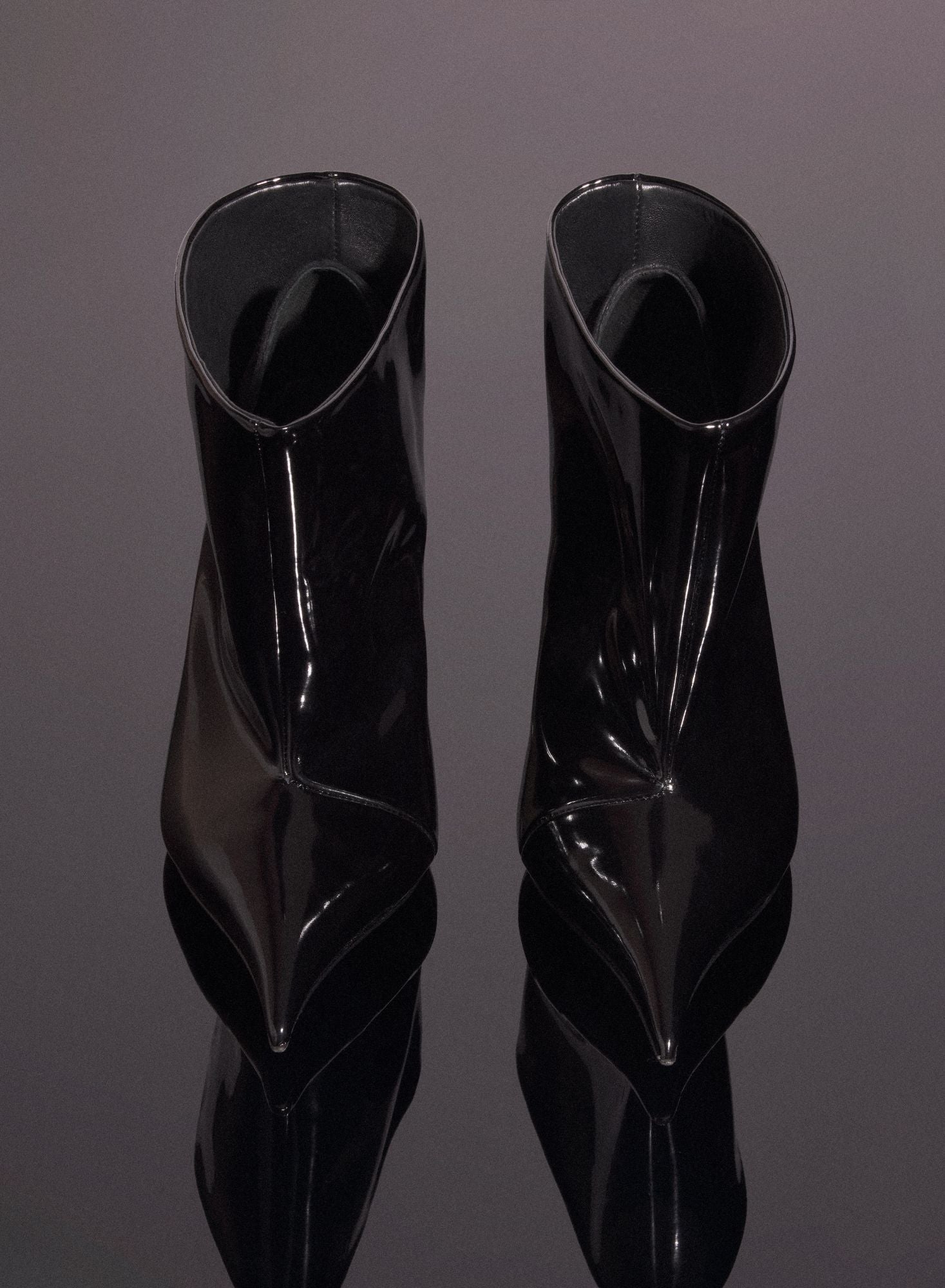 BLACK SHINY LEATHER PIERCING FANG 95 ANKLE BOOTS