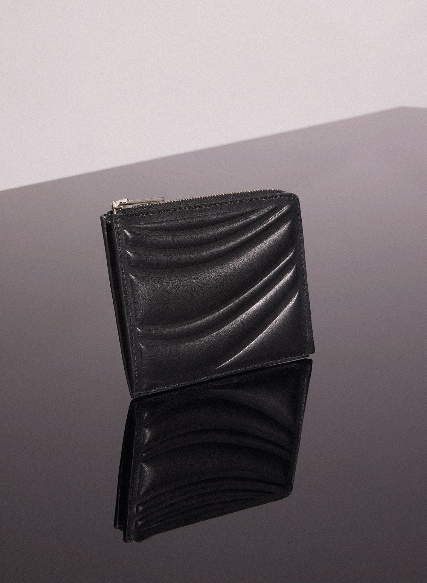 BLACK EMBOSSED SPIRAL WALLET