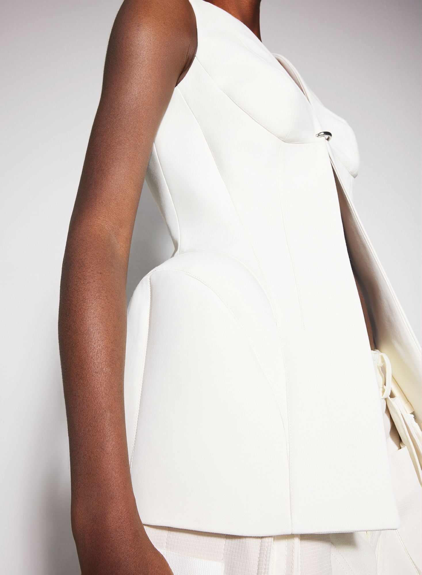 WHITE CORSETED PIERCED VEST