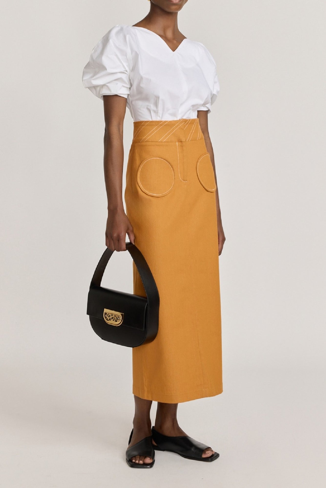 ORANGE TAKASHI DENIM  jupe crayon en jean avec poches circulaires