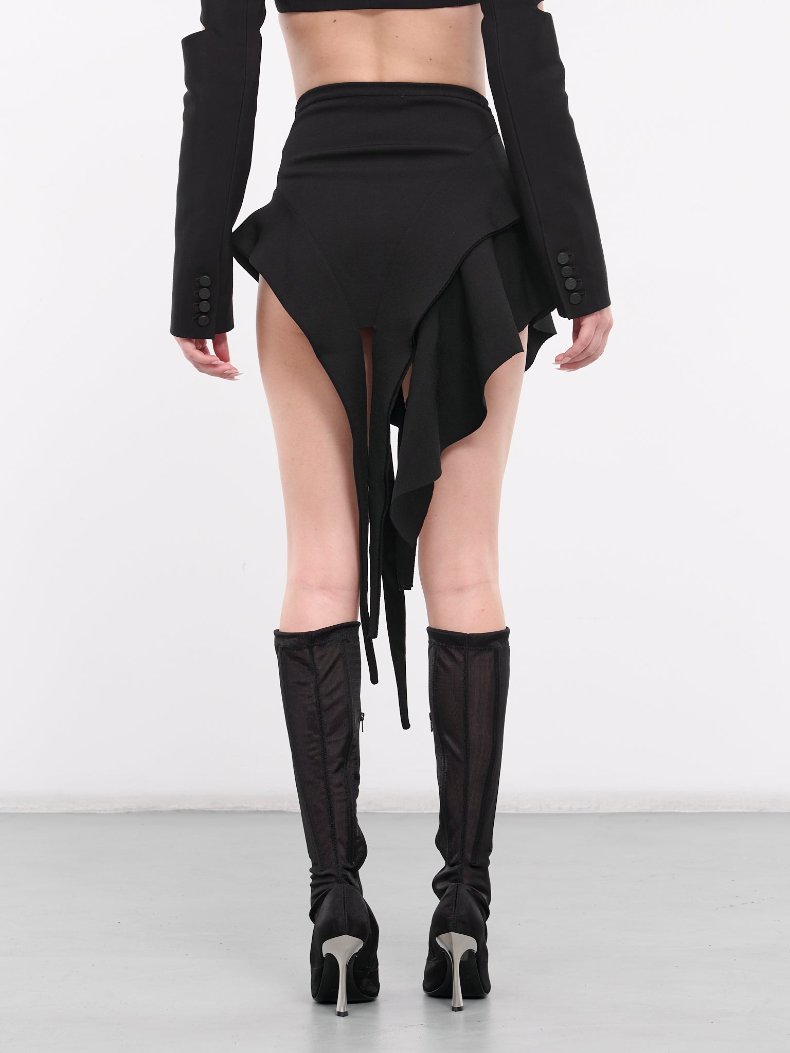 BLACK ASYMMETRIC KNITTED SKIRT