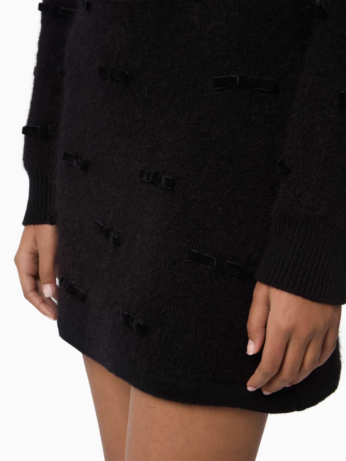 MINI-JUPE EN MAILLE MÉLANGÉE DE MOHAIR BROSSÉ AVEC NŒUDS EN VELOURS