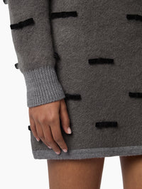 MINI-JUPE EN MAILLE MÉLANGÉE DE MOHAIR BROSSÉ AVEC NŒUDS EN VELOURS