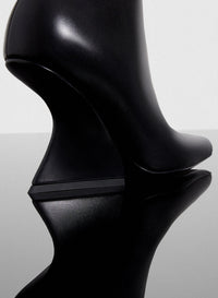 BLACK // black curved heel ankle boots