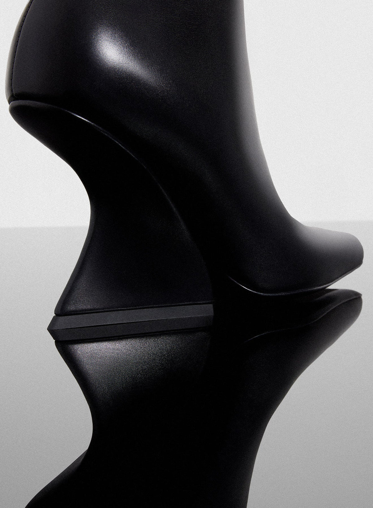 BLACK // black curved heel ankle boots