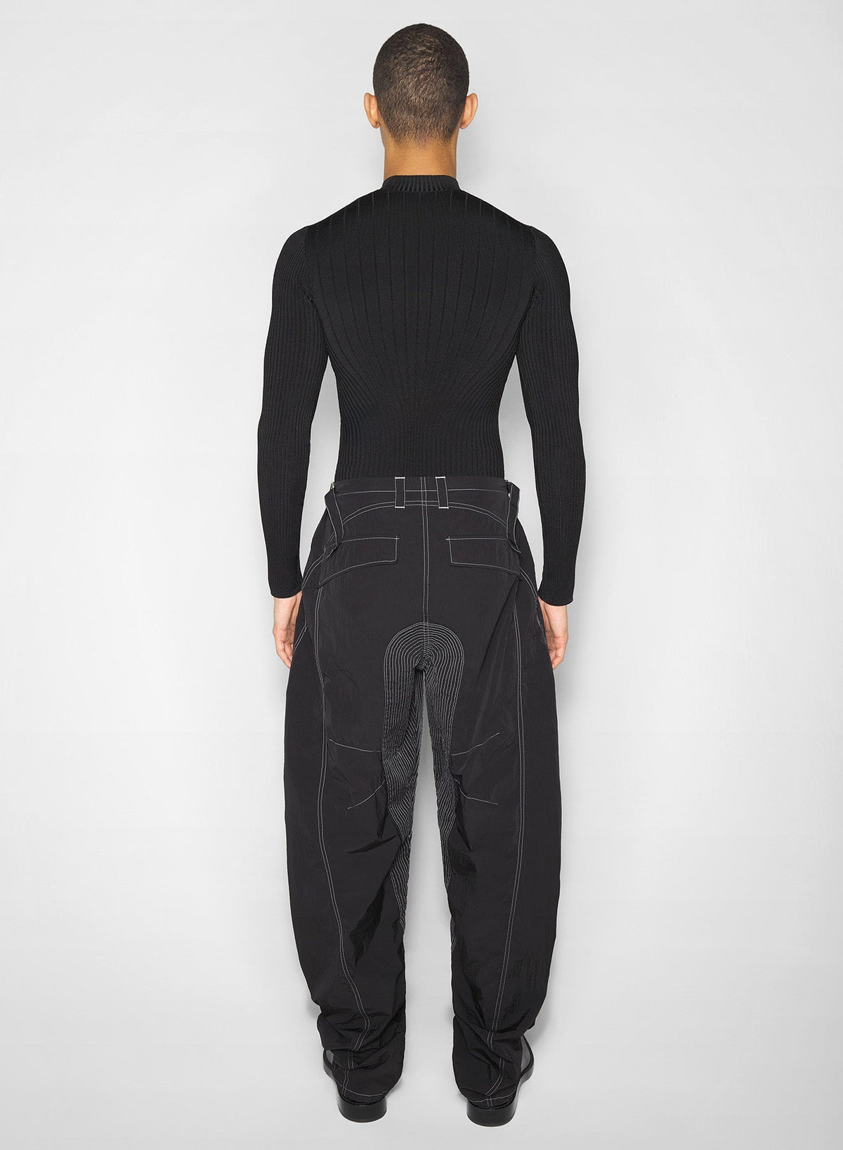 BLACK // black stitched parachute pants