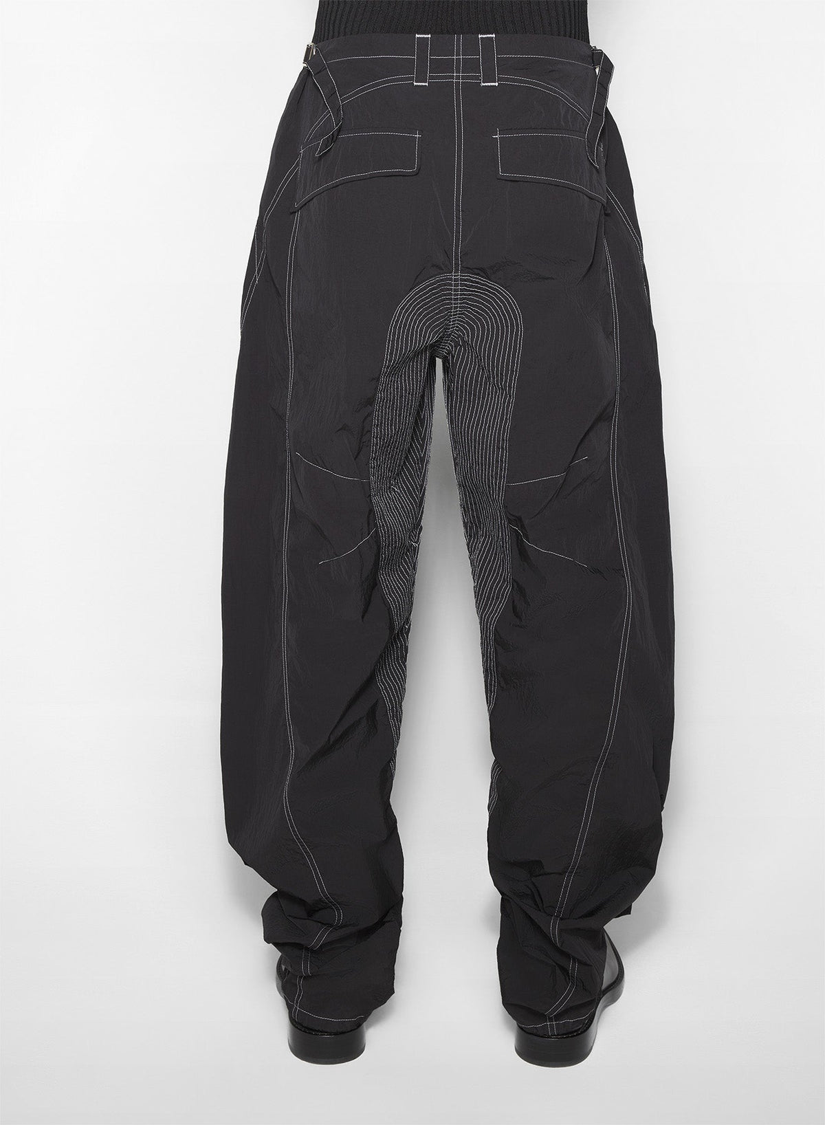 BLACK // black stitched parachute pants