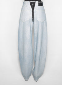 MEDIUM BLUE // blue laced-up wide-leg jeans