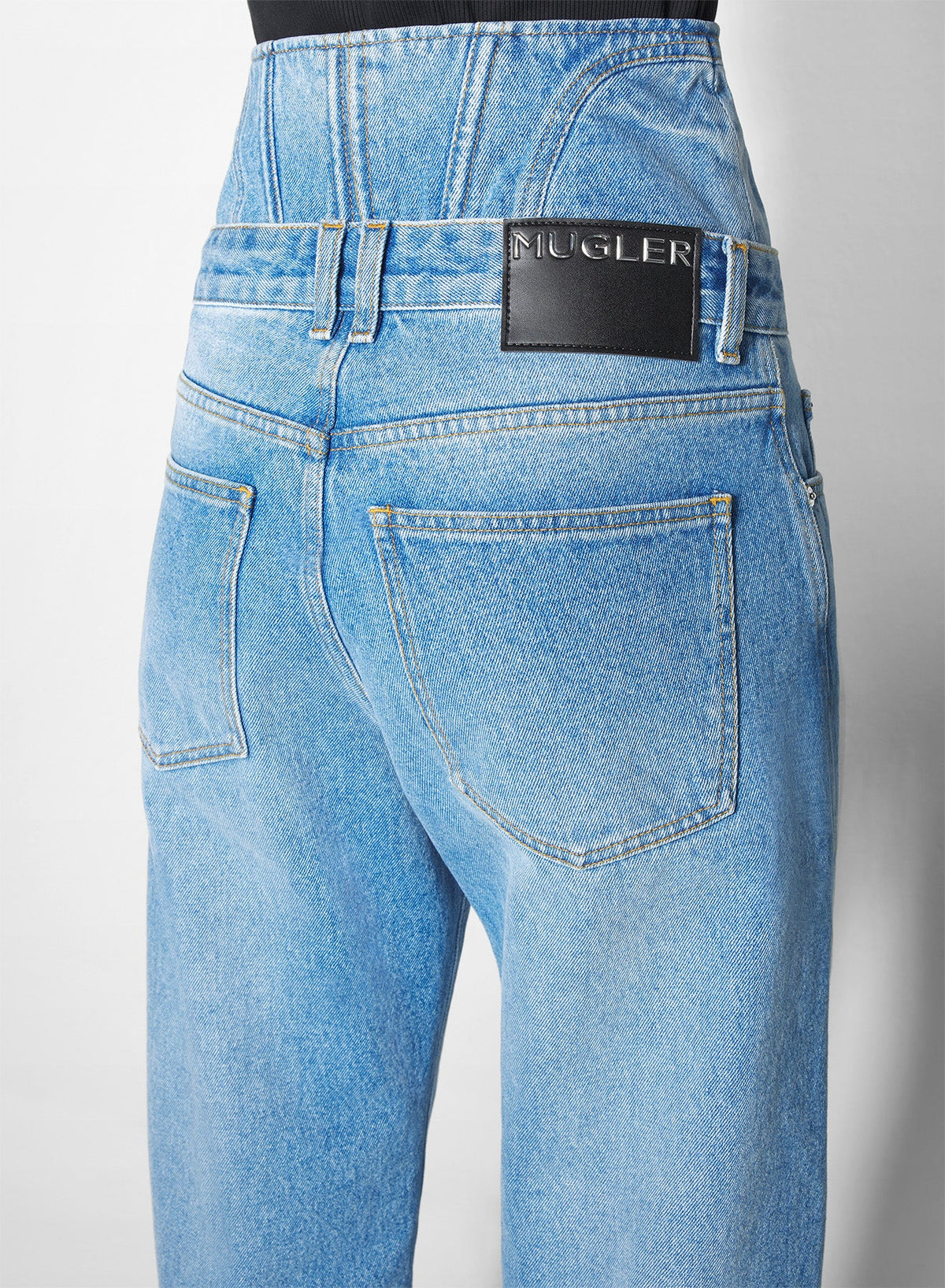 MEDIUM BLUE // washed blue high-waisted corset jeans