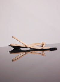 BLACK LEATHER KNOTTED FLAT SANDALS