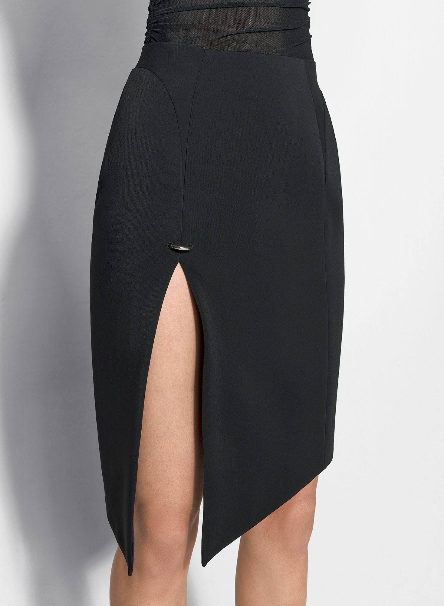 WHITE ASYMETRICAL PIERCED SKIRT