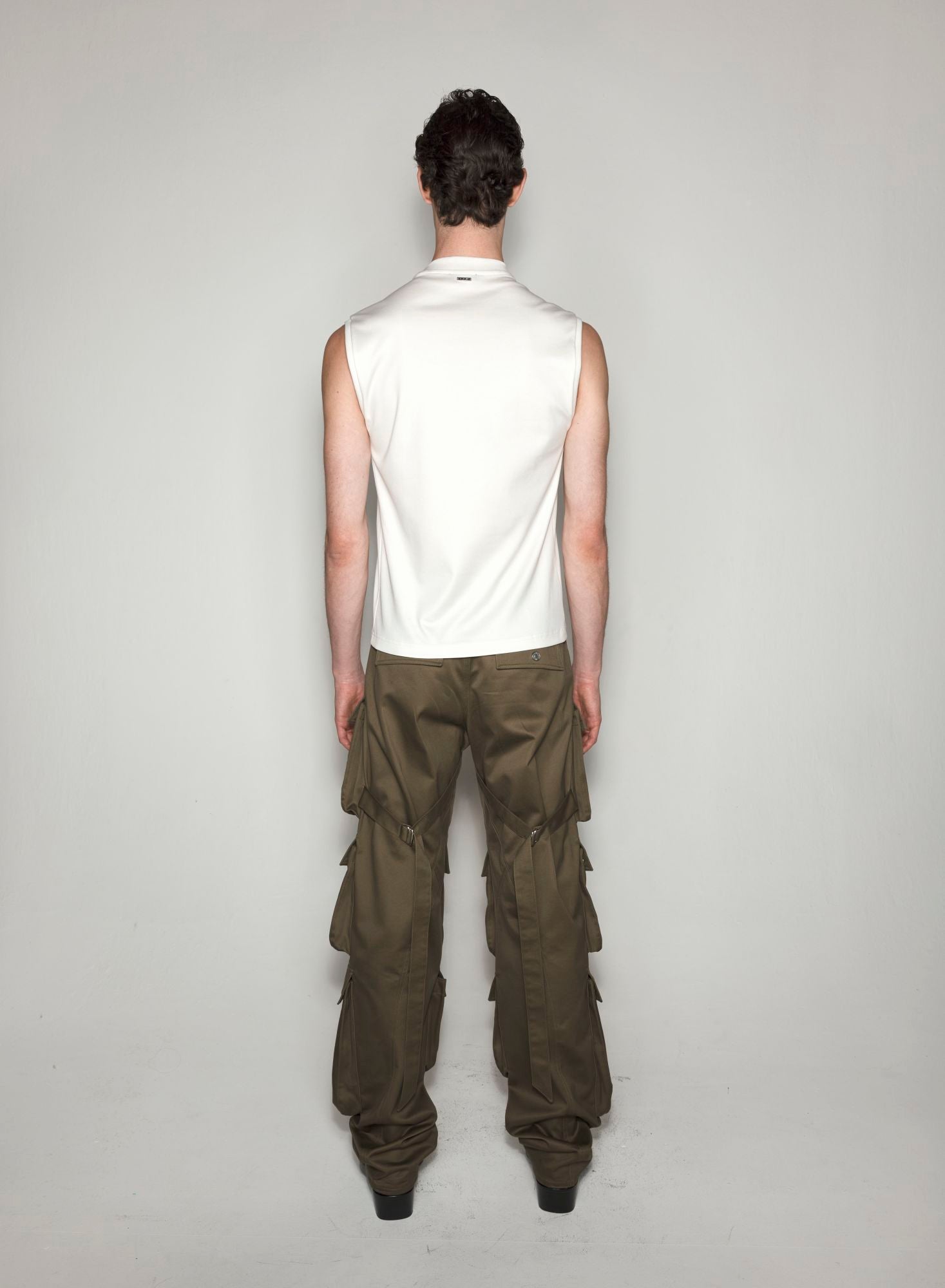 WHITE PIERCED SLEEVELESS TOP