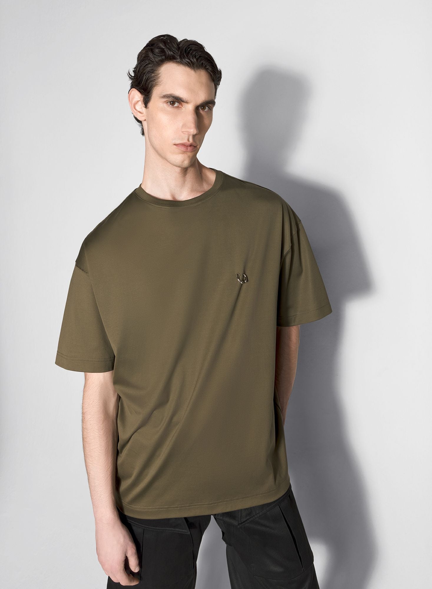 BLACK OVERSIZED PIERCED T-SHIRT