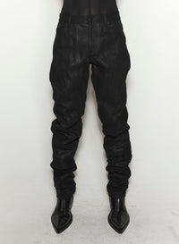 WAXED BLACK SPIRAL BAGGY JEANS