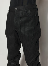 WAXED BLACK SPIRAL BAGGY JEANS