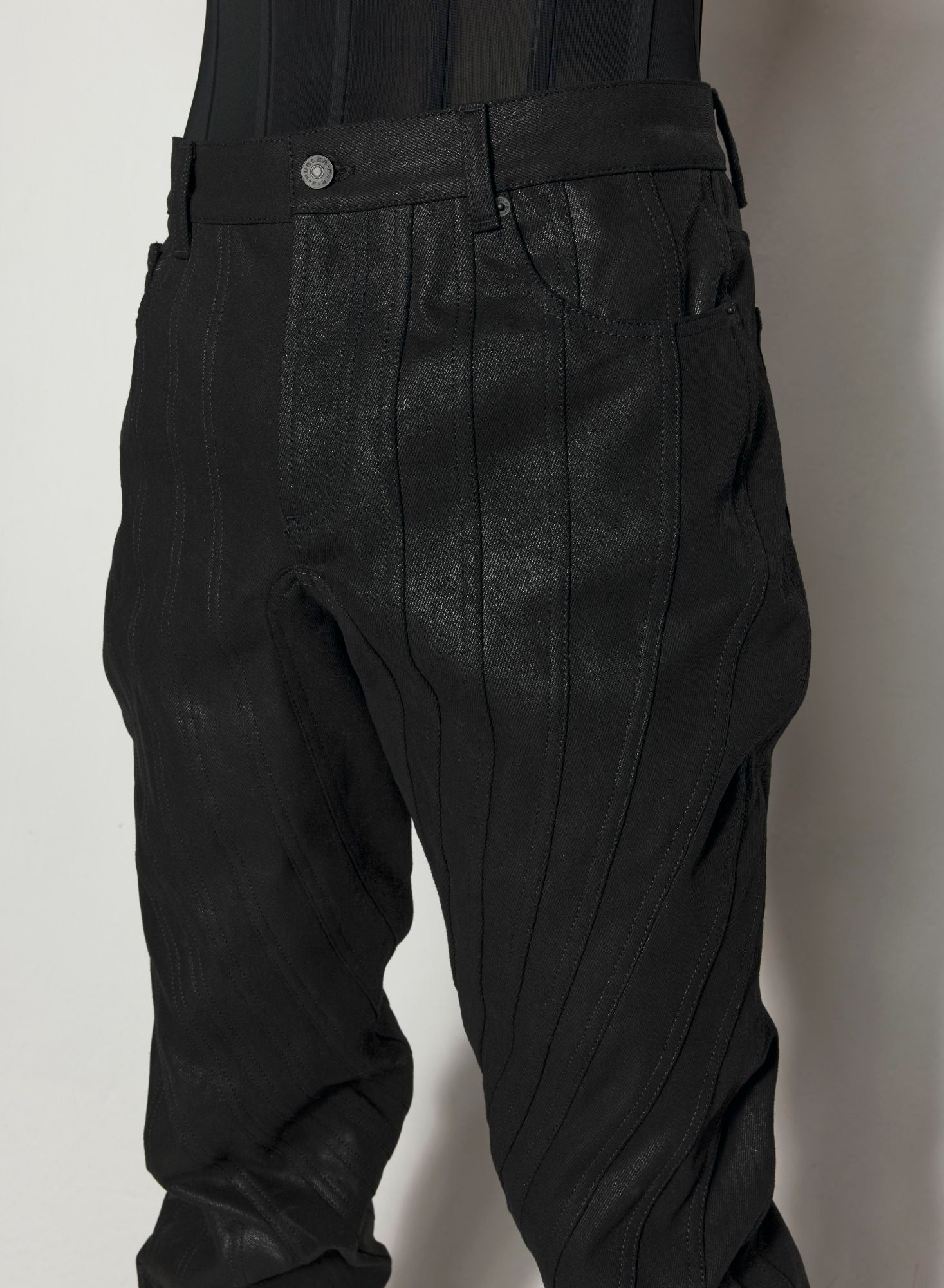 WAXED BLACK SPIRAL BAGGY JEANS