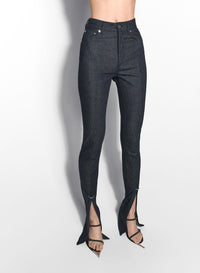 PIERCED RAW DENIM SKINNY JEANS