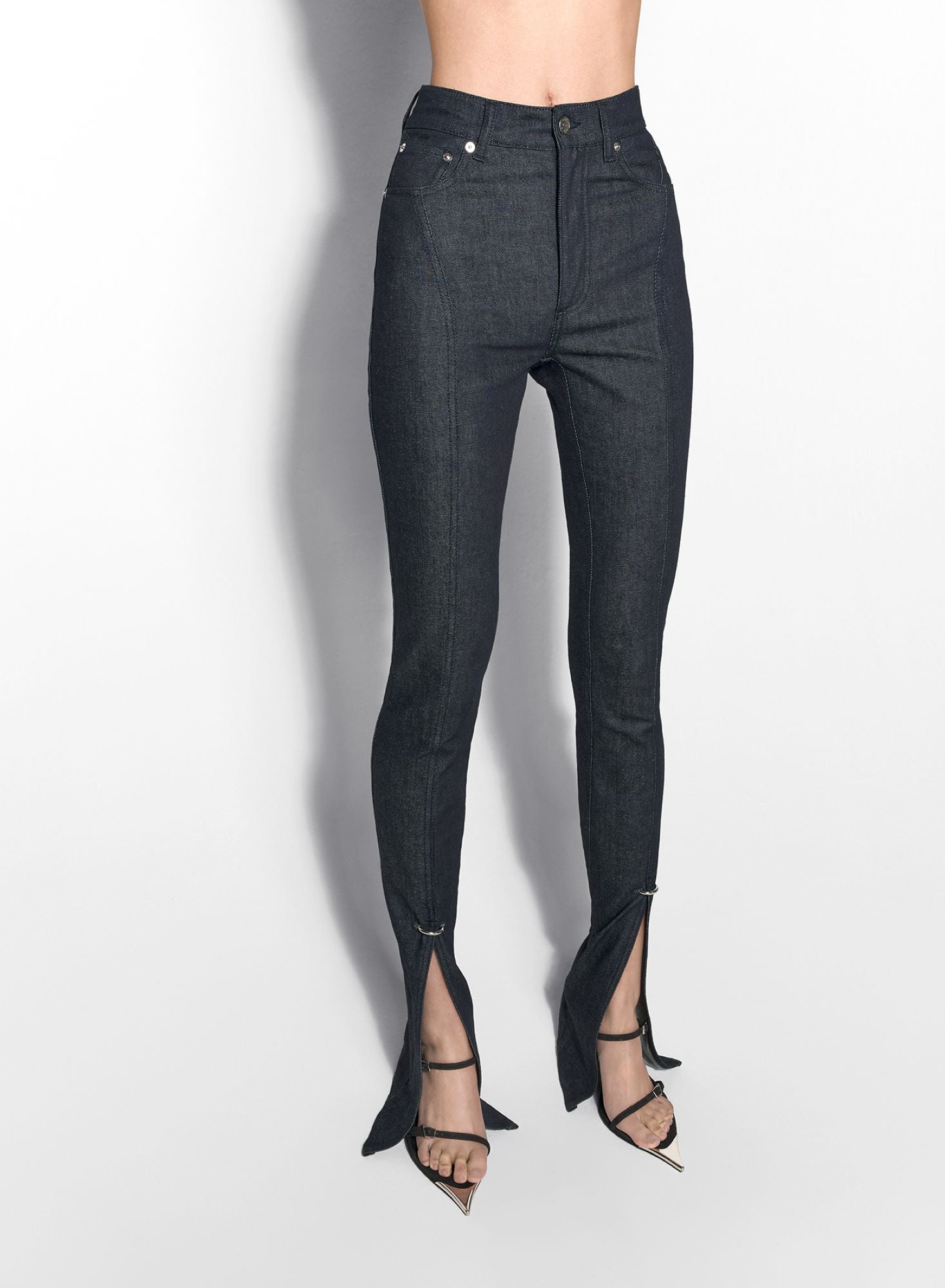PIERCED RAW DENIM SKINNY JEANS