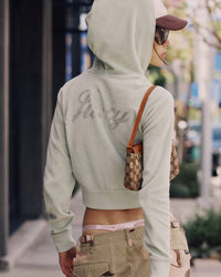 Sweat à capuche zippé en velours « Juicy Script » - Sauge