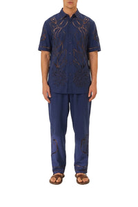 Surrealist Richelieu-embroidered linen trousers - Blue