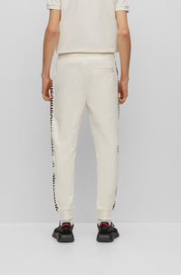 OPEN WHITE // CASUAL TROUSERS DOSTRICH
