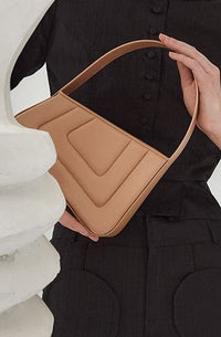 ORANGE ALBERT SMALL QUILTED Mini-sac asymétrique en cuir matelassé