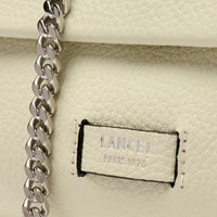 Ninon Soft mini flap bag in leather - Snow