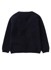 Tricot cardigan with pom poms