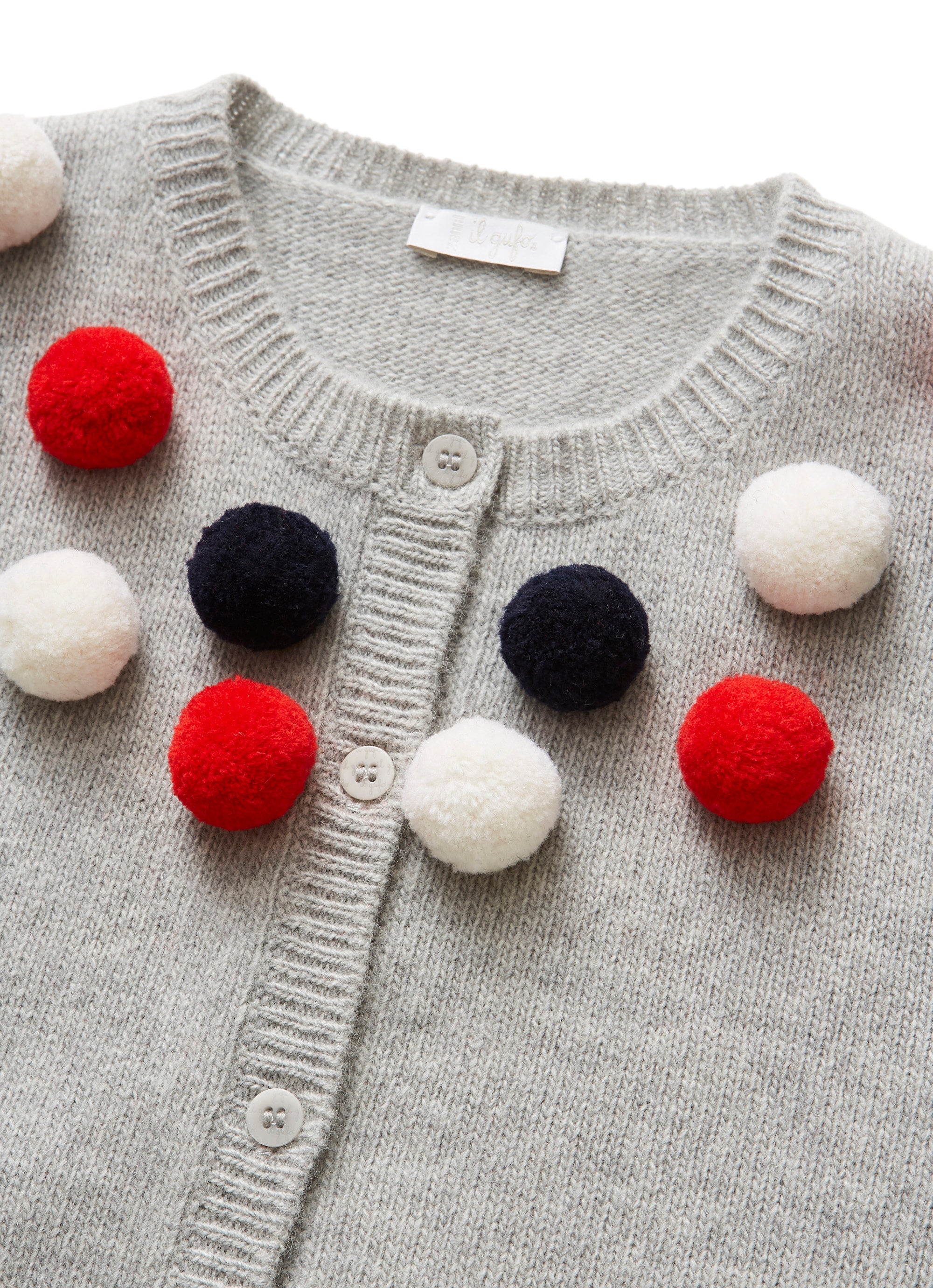 Wool cardigan with pom-poms