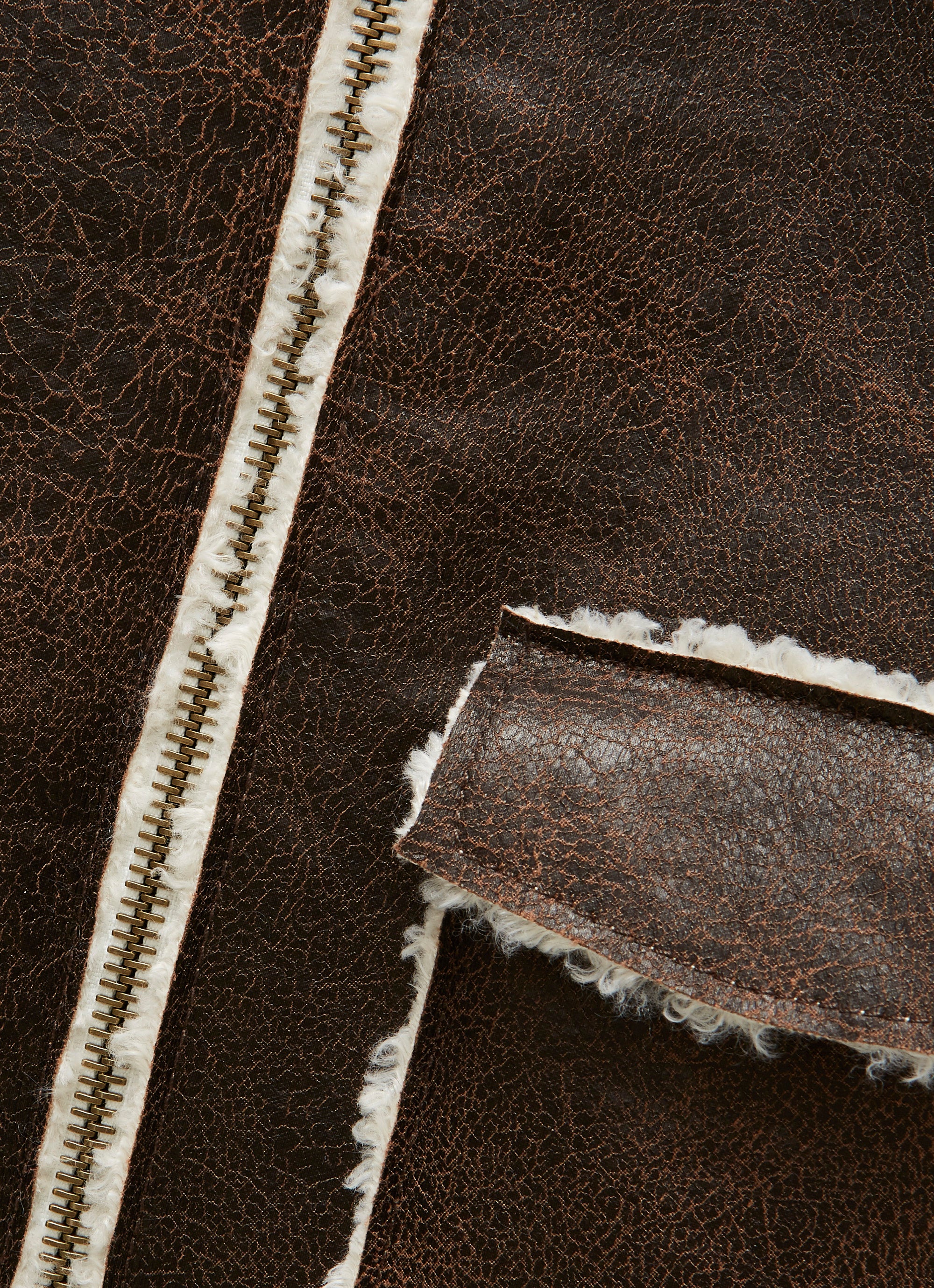 Brown faux-sheepskin jacket with contrast curly trim
