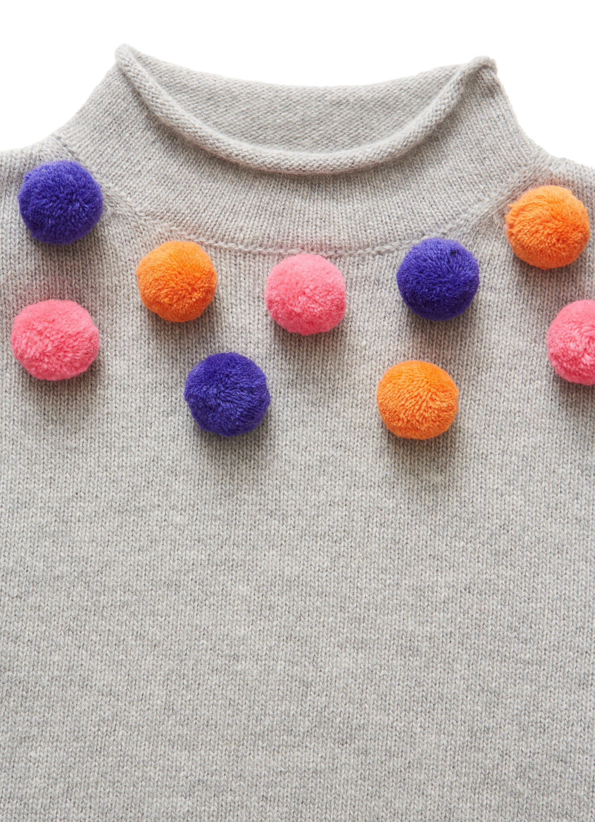 Grey sweater with pom-poms