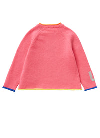 Shocking pink sweater with lettering