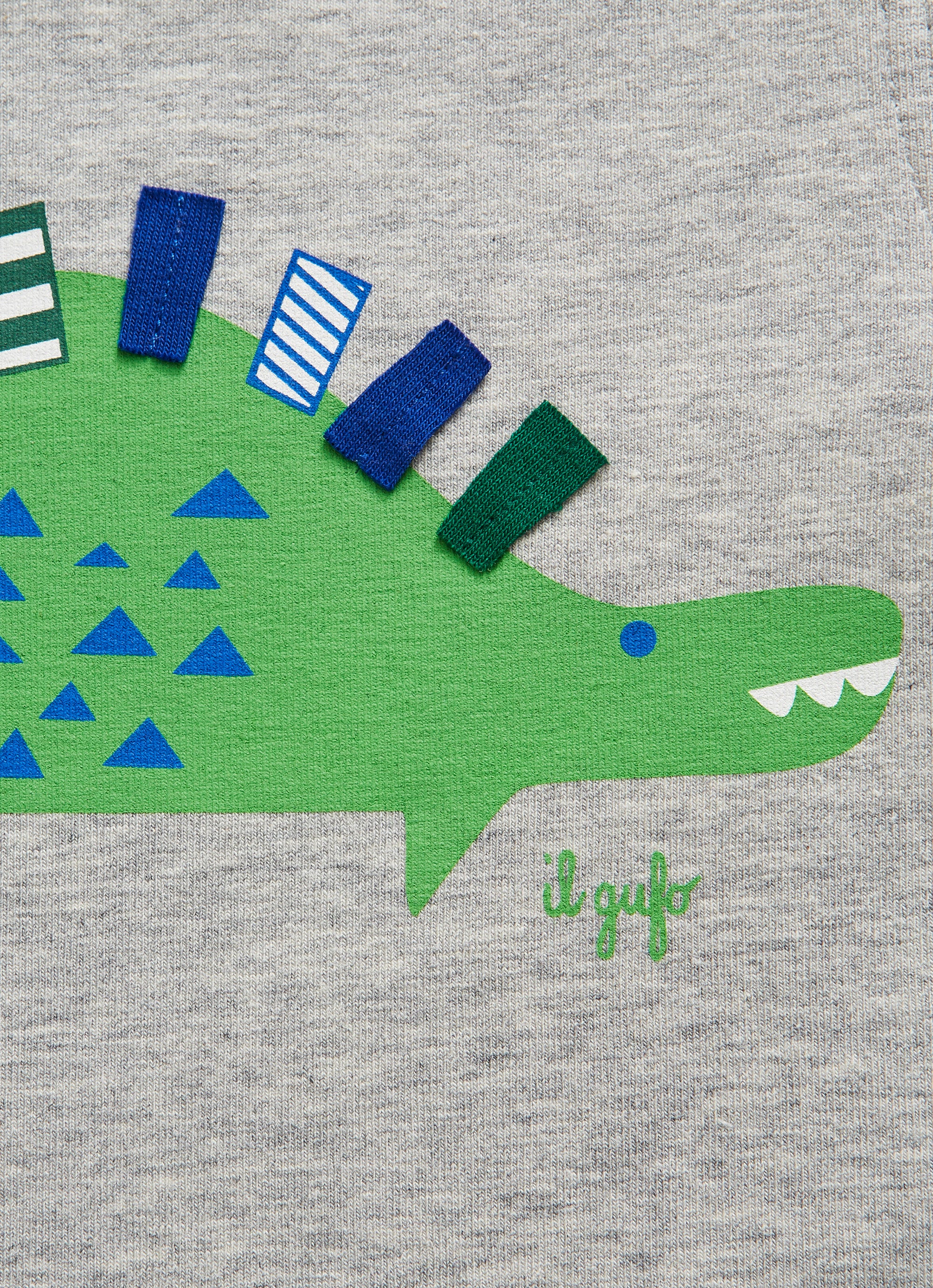 T-shirt with printed green dinosaur motif