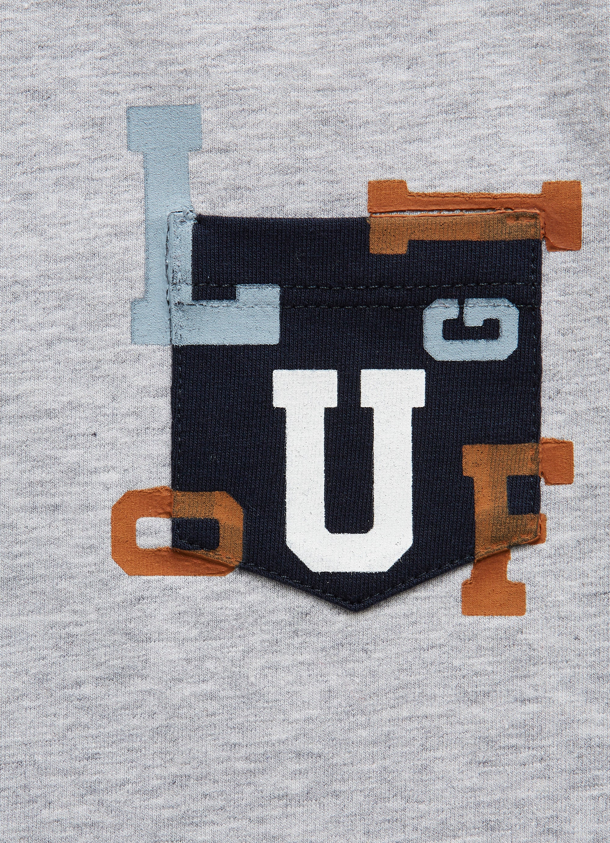 T-shirt with pocket and lettering