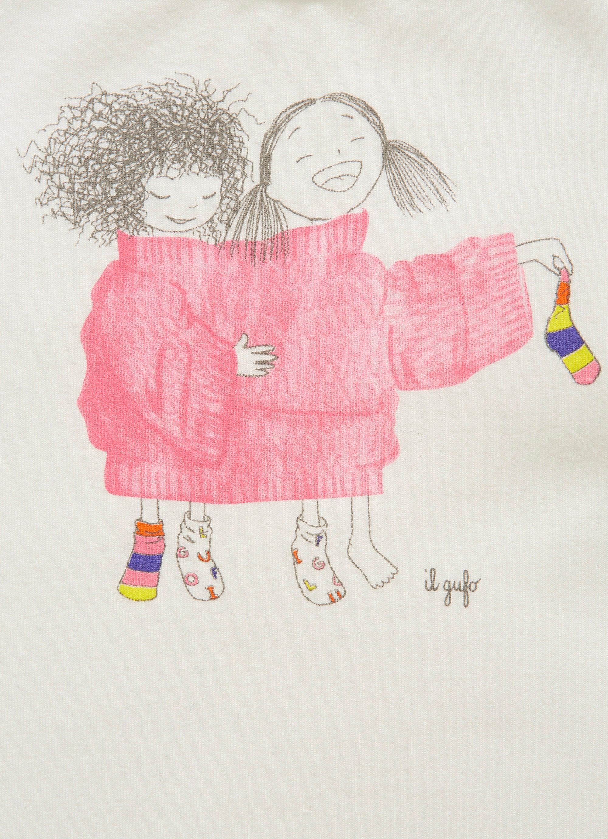 T-shirt with little girls wearing shocking pink sweaters