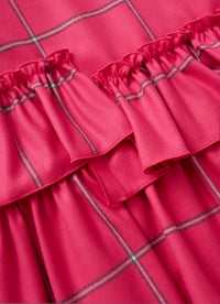 Shocking pink check dress with asymmetric maxi flounce