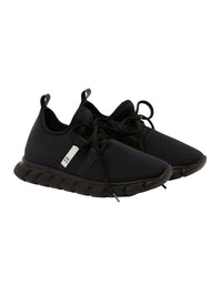 Black sneakers with decorations