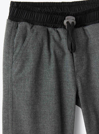 Pantaloni in tecnowool con dettagli tecnici